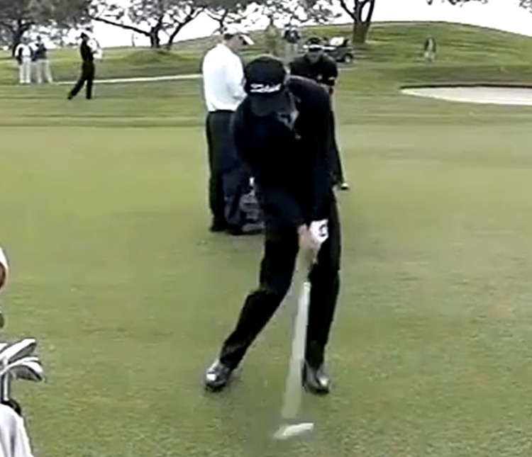 Adam whipping through the ball at impact.