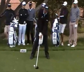 Phil Mickelson setting up to hit a big drive.