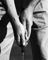 Classical putting grip.